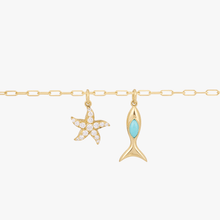 Load image into Gallery viewer, Chaîne de corps Sabina, extra longue, or jaune 18 carats, étoile de mer diamants blancs, poisson turquoise naturelle, close up