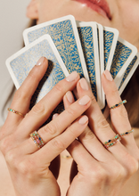 Load image into Gallery viewer, Bague Gaia 3 Verte avec saphir bleu, cognac, jaune et émeraude porté 1
