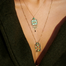 Load image into Gallery viewer, Collier Rita 2 Vert or 18k émeraude, émail, saphir, diamants Porté 1
