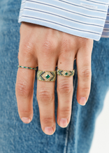 Load image into Gallery viewer, Bague Ani 3 Hydra en or 18k avec émeraudes, saphirs bleu, diamants blancs porté
